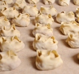 Запечатываем квадратики по углам с четырех сторон.