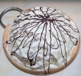 После этого растопите шоколад и украсьте торт сверху.